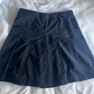 Studio London pleated mid thigh length skirt